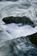 water flowing over rocks