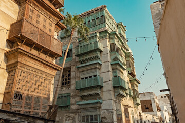 Traditional architecture of old Jeddah town El Balad district houses with wooden windows and balconies Unesco Heritage site in Jeddah Saudi Arabia