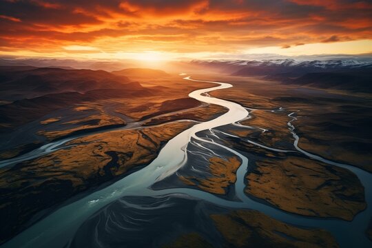 A glacial rivers from above. Aerial photograph of the river streams from Icelandic glaciers. Beautiful art of the Mother nature created in Iceland. Wallpaper background high quality photo. High
