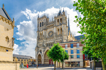 Amiens Cathedral Basilica of Our Lady Roman Catholic Church High Gothic architecture style building in old historical city centre, Cathedrale Notre-Dame, Hauts-de-France Region, Northern France - obrazy, fototapety, plakaty