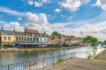 Amiens old town Saint-Leu quarter, embankment promenade of Somme river with street restaurants, traditional houses and Pont du Cange stone bridge in historical centre, Hauts-de-France Region, France