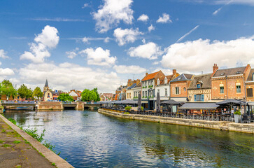 Amiens old town, embankment Quai Belu of Somme river water, street restaurants, typical buildings...