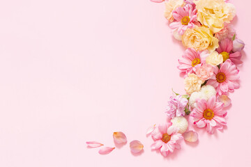 Naklejka na ściany i meble beautiful flowers on pink background