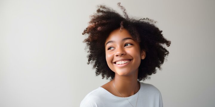 Black teenage girl smiling in a studio. generative AI