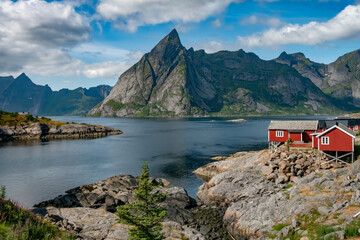 The idyllic and picture perfect fishing village of Hamnøy or Hamnøya, north Reine, Vestfjorden,...