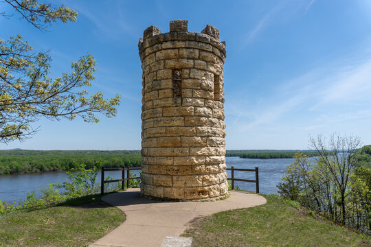 The Julien Dubuque Monument atop a limestone bluff over Mississippi River at the Mines of Spain in Dubuque, Iowa. Julien Dubuque, a Canadian, founded Dubuque as a lead mine in the 1700s.