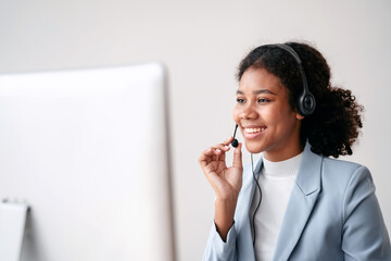 Female call center provides information to a customer calling for help, Contact us, Service with a beautiful and friendly voice, Long call distance communication, Talk using headphones or headsets - obrazy, fototapety, plakaty