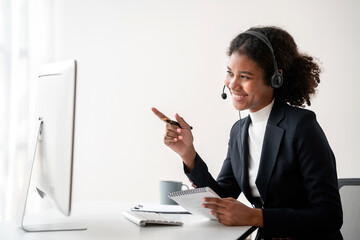 Female call center provides information to a customer calling for help, Contact us, Service with a beautiful and friendly voice, Long call distance communication, Talk using headphones or headsets