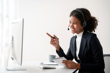 Female call center provides information to a customer calling for help, Contact us, Service with a...