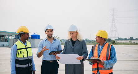 Engineers working on solar installations to create an eco-friendly and renewable power generation. Professionals working outdoors to develop modern and sustainable solar energy solutions.