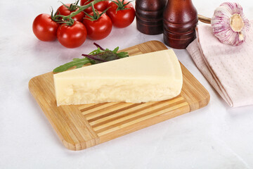 Piece Italian hard parmesan cheese