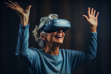 A happy mature woman playing with virtual reality glasses. Entertainment and technology in elderly. Innovation and imagination interactive experience
