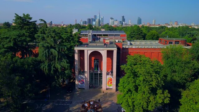 Aerial view of the summer trees in the sempione park next to the castello sforzesco. Triennale Milano Design Museum. View of modern skyscrapers. Ecology. Green Planet. Milan Italy