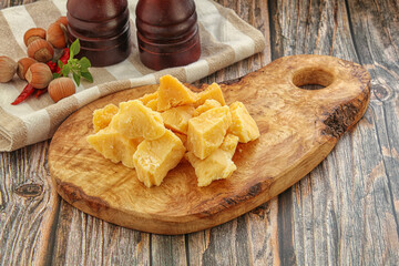 Crushed hard parmesan cheese pieces