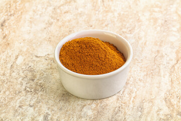 Dry Paprika powder in the bowl