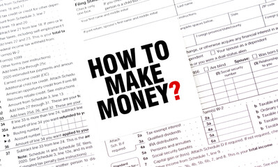 HOW TO MAKE MONEY on white sticker with documents