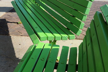 Bench for rest in a city park on the shores of the Mediterranean Sea.