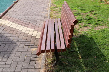 Bench for rest in a city park on the shores of the Mediterranean Sea.