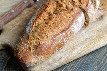 Dark wheat loaf of bread