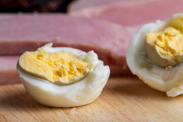 Boiled chicken egg with sliced pieces of meat