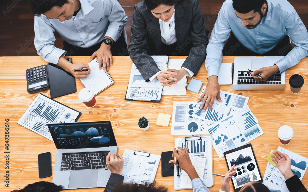 Aufkleber top view multiracial analyst team use bi dashboard data to analyze financial report on meeting table