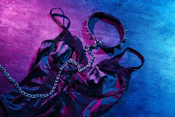 Sexy underwear with collar on dark background - obrazy, fototapety, plakaty