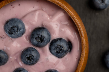 fresh blueberry-flavored yogurt with ripe blueberries