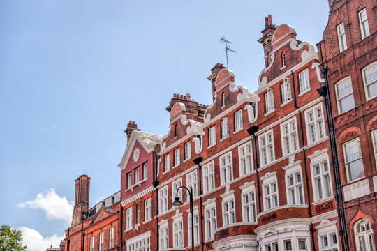 London, England - July 11, 2023: A classic red brick residential building in the Knightsbridge district of London
