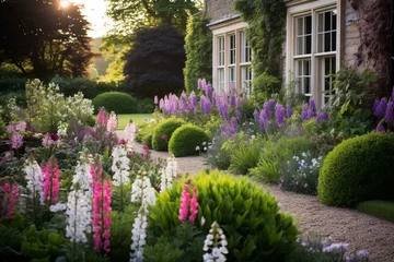 Foto op Canvas Beautiful garden with elegant flower beds, gravel path, and Cotswold cottage garden style landscape design. Generative AI © Isolde
