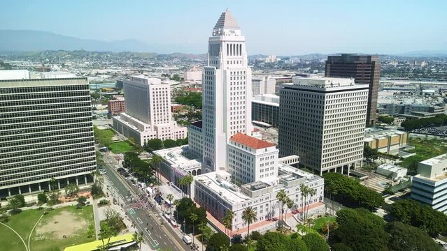 Aerial view downtown Los Angeles. Drone shot of LA skyline, modern office buildings, skyscrapers, apartments. Urban life, financial business city center.