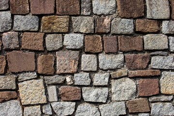 Stone brick wall.  Architectural seamless pattern of an ancient wall. Textured background with copyspace.