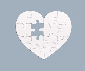 Lacking missing puzzle piece, element in heart jigsaw
