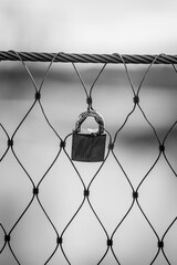 Padlock on fence