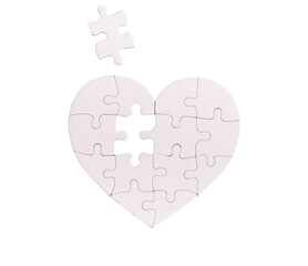 Lacking missing puzzle piece in heart jigsaw, isolated on white