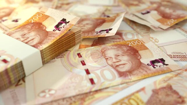 3D animation of Camera panning around spread 200 South African Rand notes. Camera moving around Scattered Rand notes 