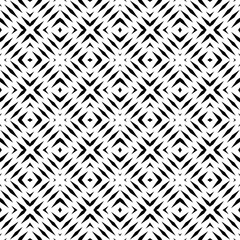 Seamless pattern with geometric motifs in black and white