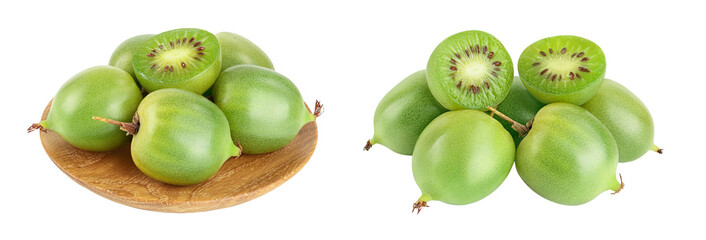 mini kiwi baby fruit or actinidia arguta in wooden bowl isolated on white background with full depth of field.