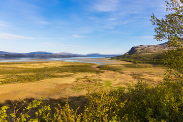 Typical norwegian landscape with fjords and wetland near Lakselv in Norway