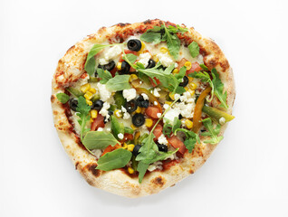 Greek pizza with mozzarella and feta cheese, tomato, olives, corn, paprika isolated on white background. Pizza top view.