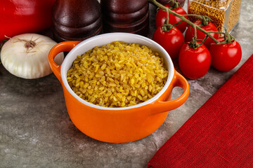 Dry wheat bulgur cereal heap