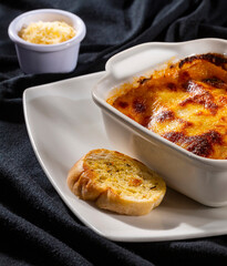 Classic cooked Italian lasagna on a baking sheet