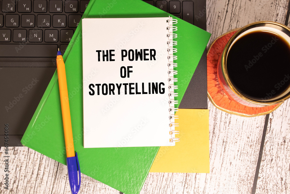 Poster business concept. notebook with text the power of storytelling sheet of white paper for notes.