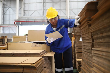 worker or engineer working in factory with safety uniform , safety hat and safety glasses , image...