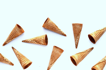 Empty ice cream cone on white background.
