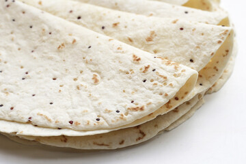 Quinoa tortilla wraps on white background