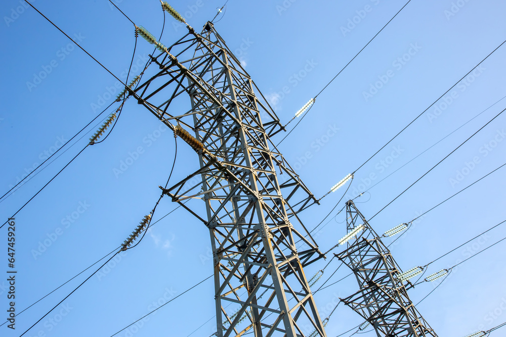 Wall mural power line support with wires for electricity transmission. High voltage grid tower with wire cable at distribution station. Energy industry.