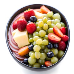 bowl with fresh fruit and vegetables on a white background