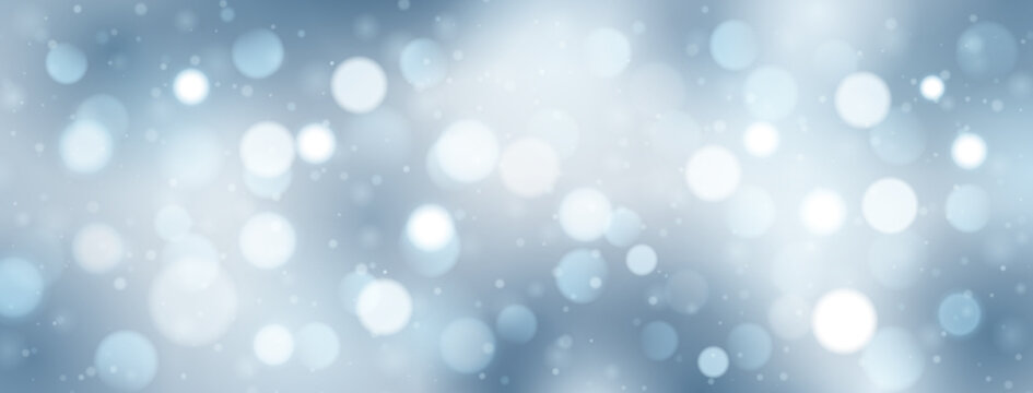Abstract background with bokeh effect in light blue colors