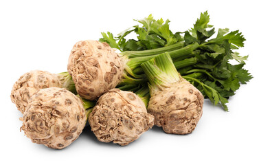 Fresh raw celery roots with stalks isolated on white