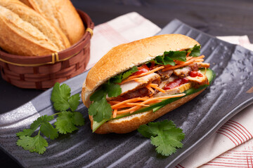 Pan-Asian dish setup on the dark table